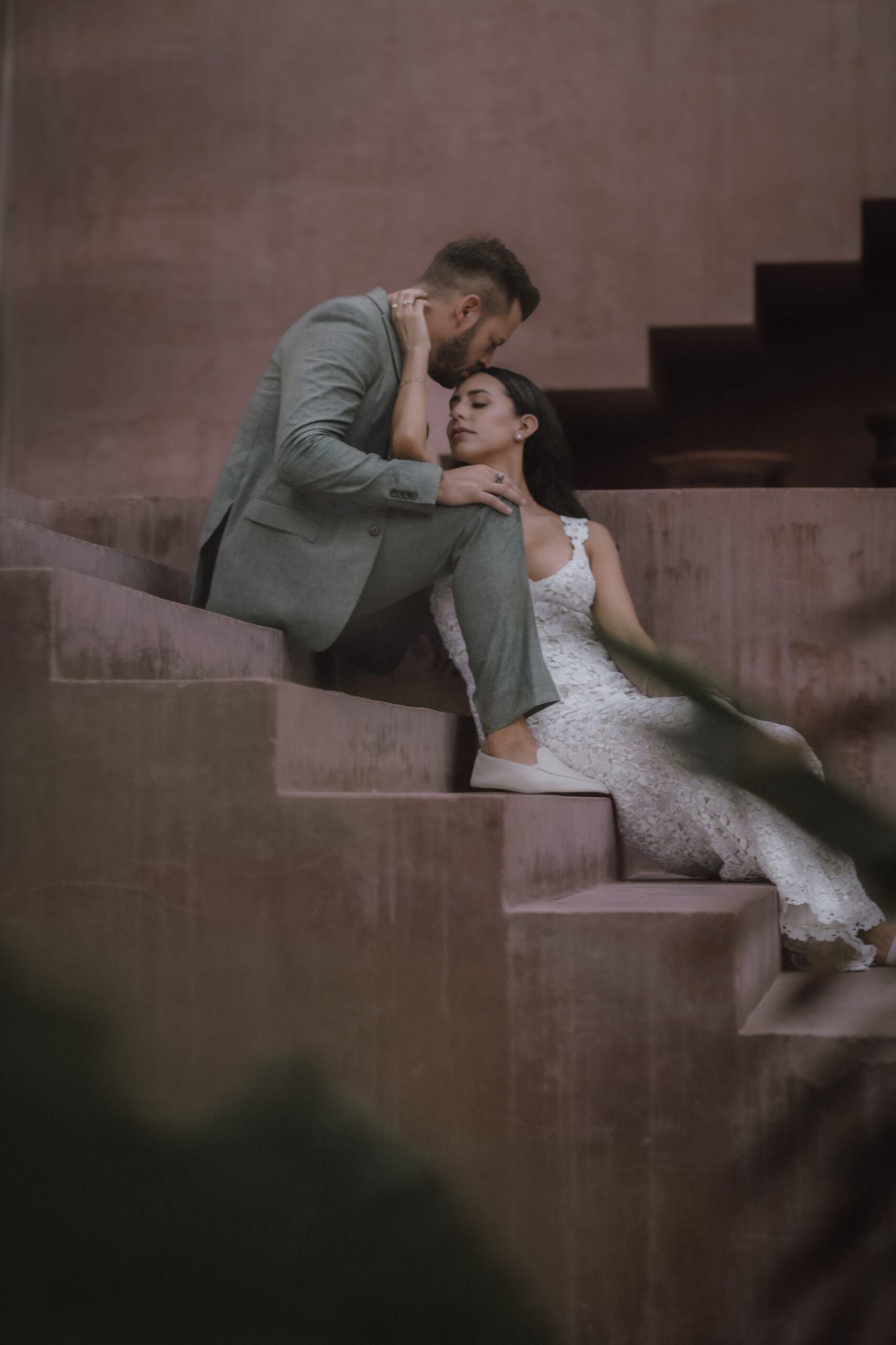 Editorial style elopement on stairs of Xela Tulum.