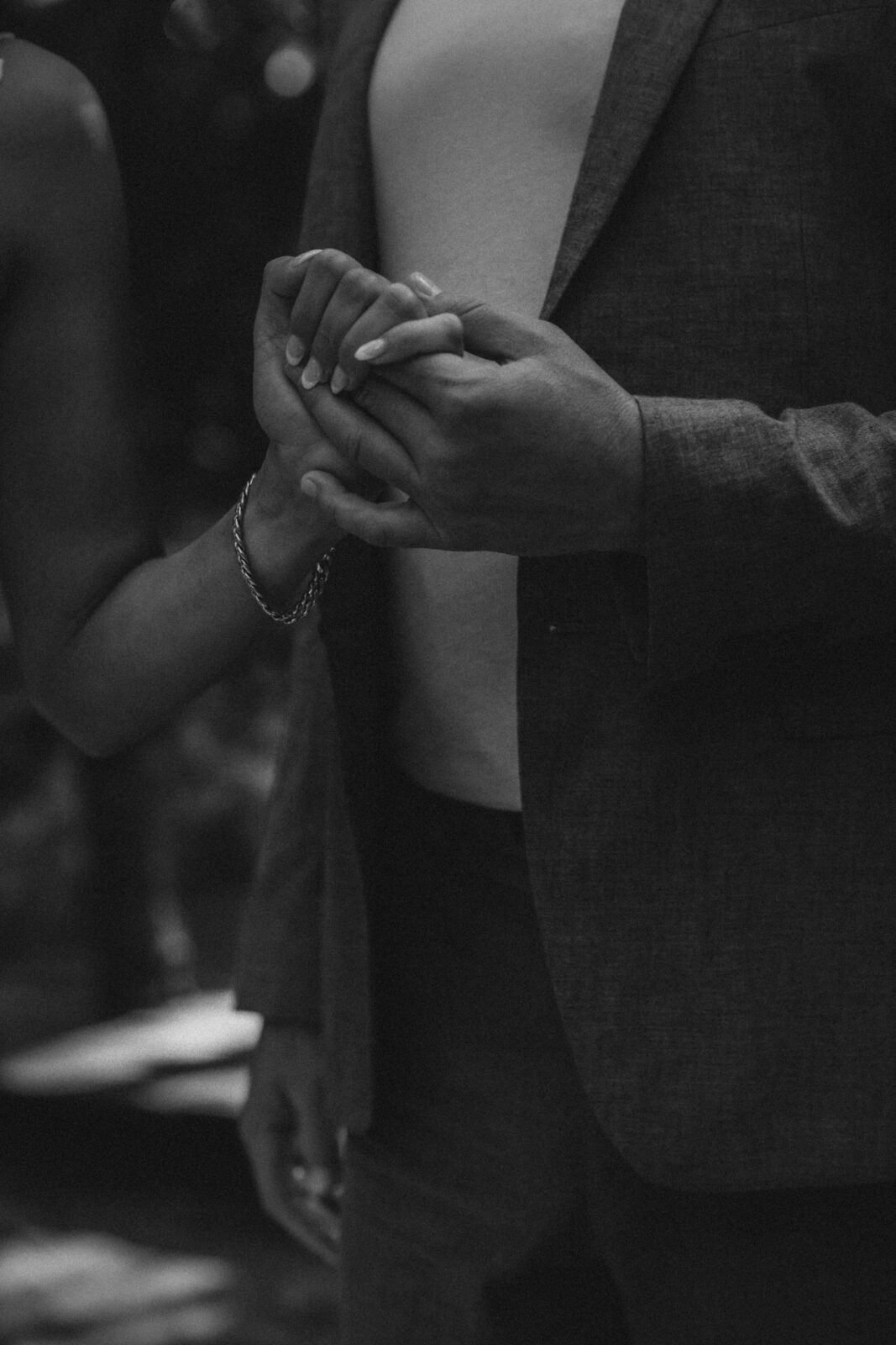 Bride and groom hold hands during a mayan elopement ceremony in Tulum