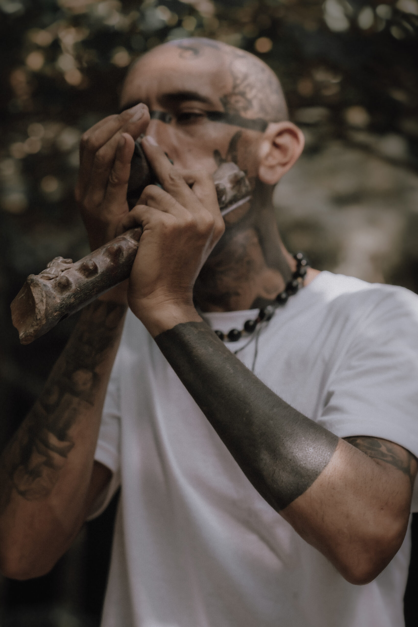 Sound ceremony during a Mayan elopement at a cenote in Tulum.