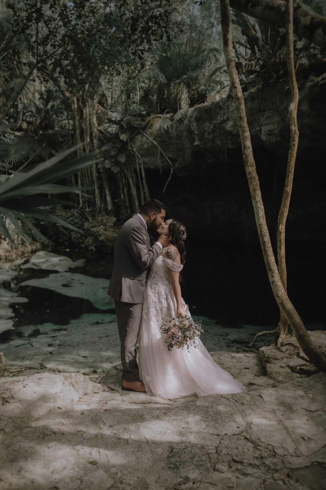 Elopement ceremony at a cenote in Tulum